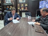 Pedro Luxen y Javier Belloni firman acuerdo